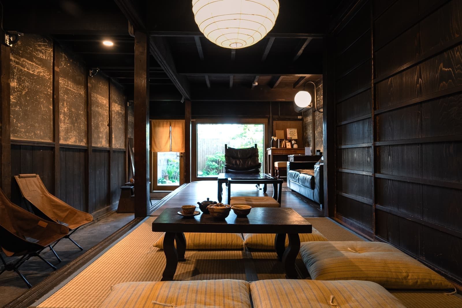 Seisei-an — black-lacquered beams, and the garden beyond